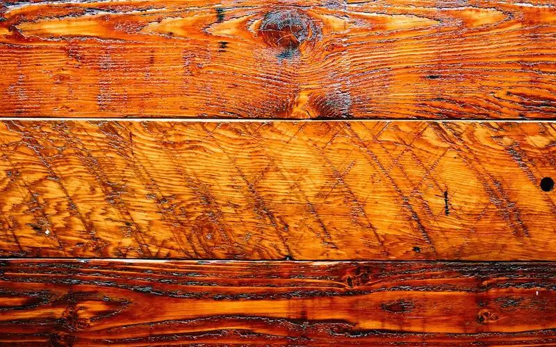 close up of natural wood grain texture on an outdoor table surface close up of natural wood grain texture on an outdoor table surface