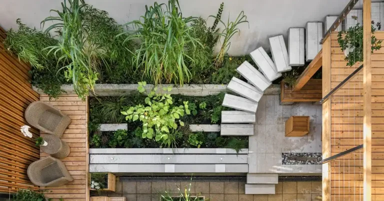 Wood patio deck with landscaped garden showing a composite decking design idea