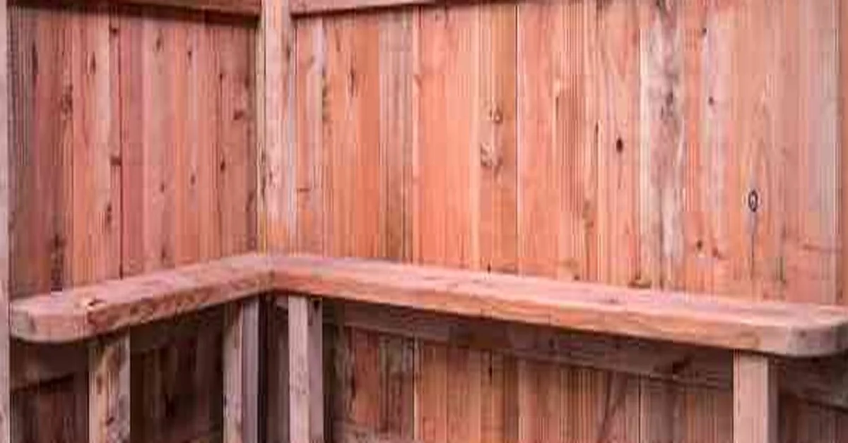 Close-up of redwood deck boards used to build a built-in corner bench