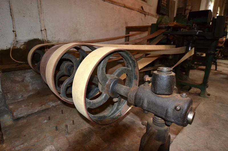 Woodshop joinery and shaping equipment used to build a rocking chair's curved leg joints