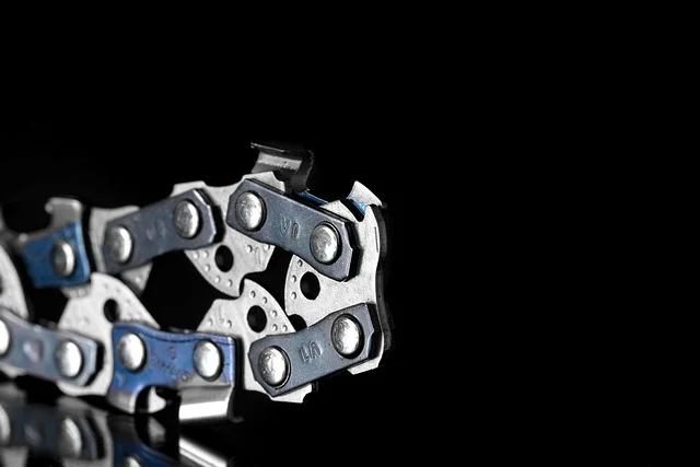 Close-up of a 3/8-inch low-profile chainsaw chain, the same pitch used on Ryobi 14-inch bars