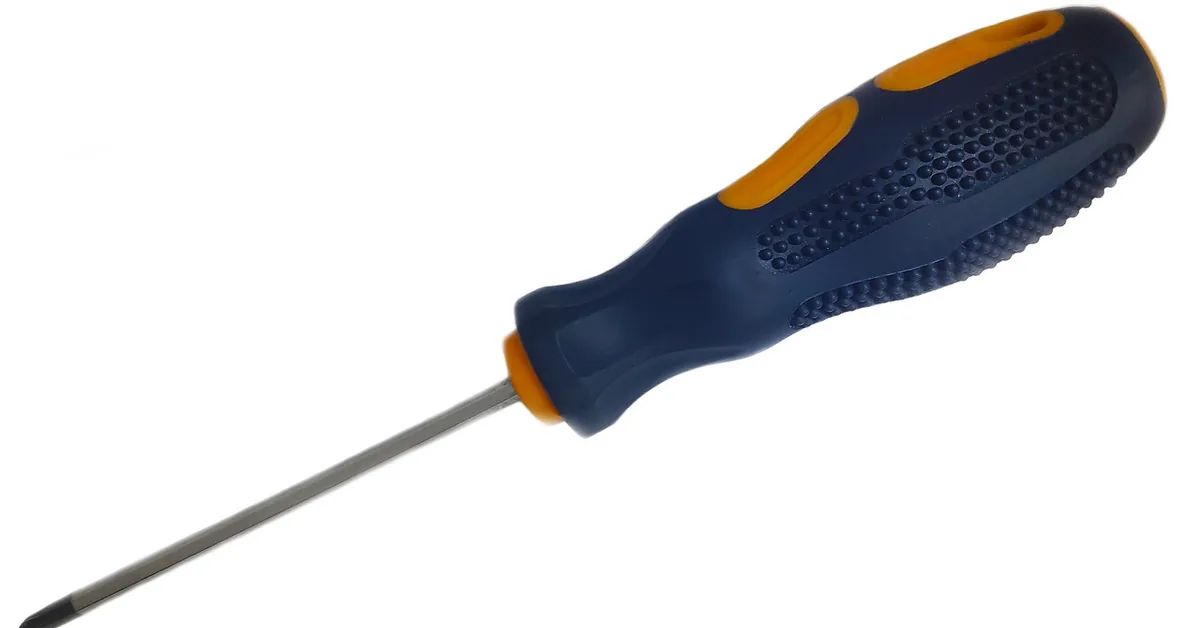 Phillips-head screwdriver used to back out a stripped wood screw by hand, no drill needed
