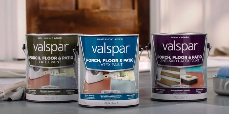 Three cans of Valspar paint in satin, gloss, and anti-skid finishes for porch, floor, and patio use