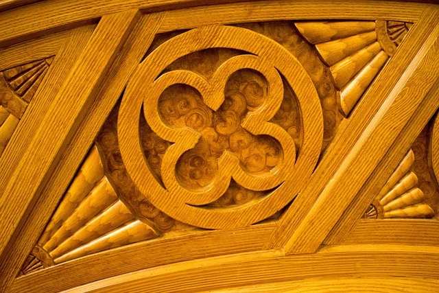 Craftsman hand-shaping wood joinery details