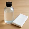 Water-based pre-stain wood conditioner bottle with cloth