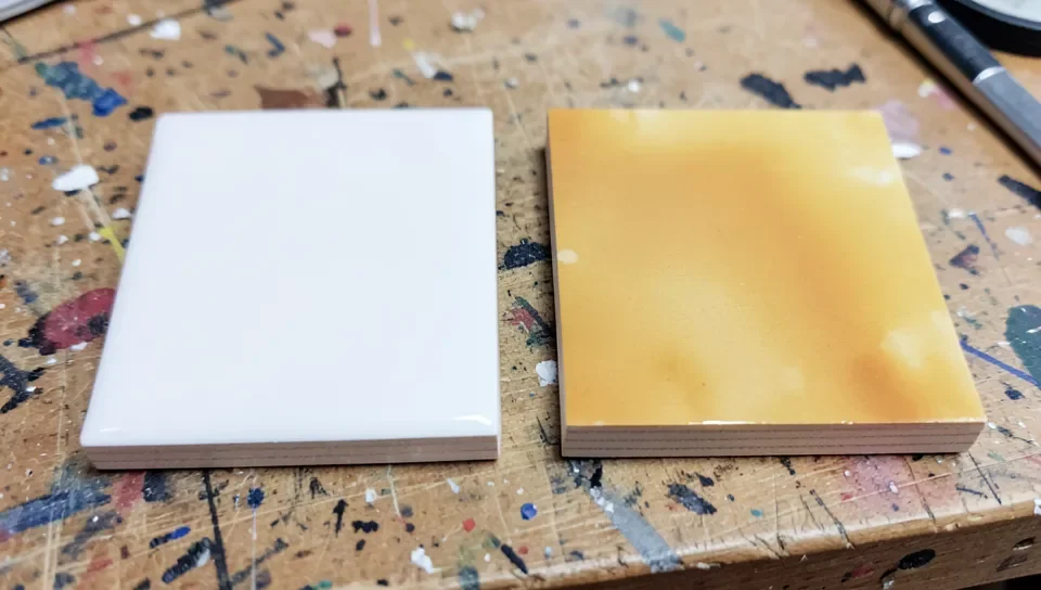 Water-based polyurethane stays clear over acrylic paint while oil-based polyurethane yellows over time