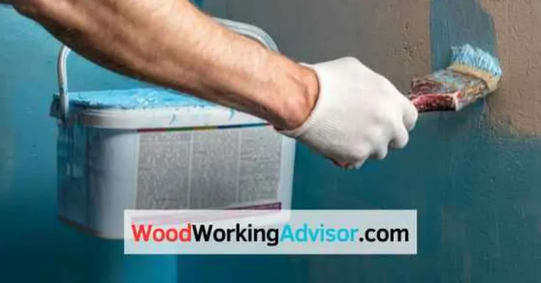 Applying waterproof paint to seal wood in a bathroom