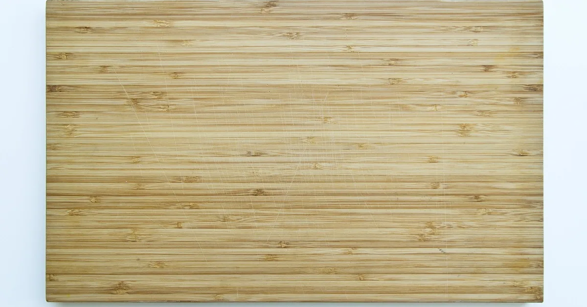 Wood cutting board with visible grain before food-grade linseed oil treatment