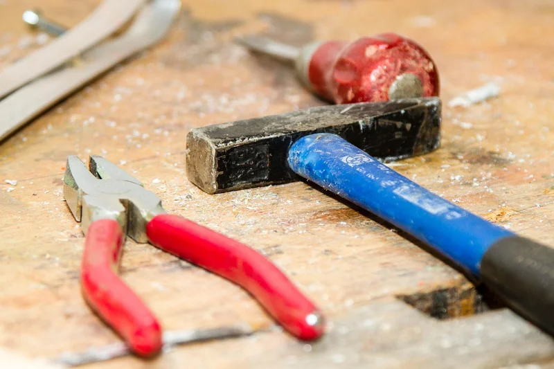Workbench with hand tools used for shaping and joinery during a chair build