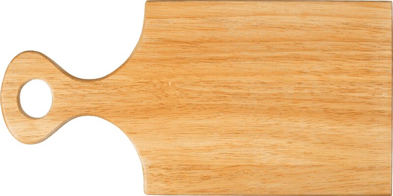 Wooden cutting board being oiled with a cloth to condition the surface