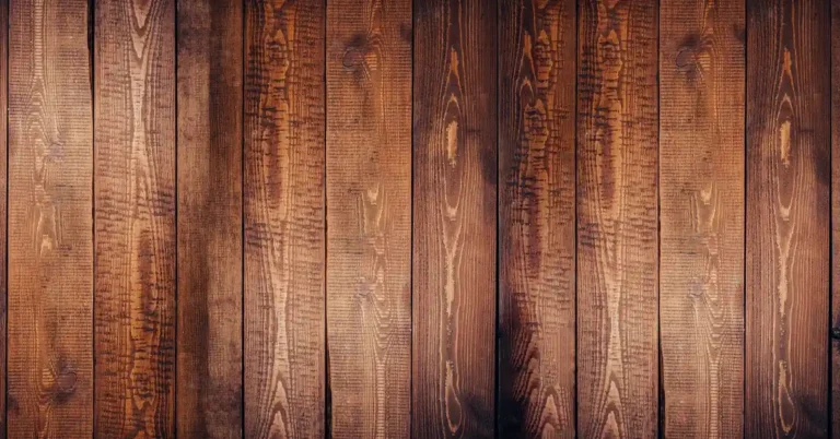Reddish-brown hardwood planks showing straight grain and knots