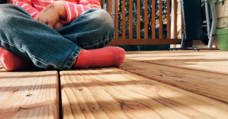 close-up of real wood decking boards showing natural grain on a backyard deck