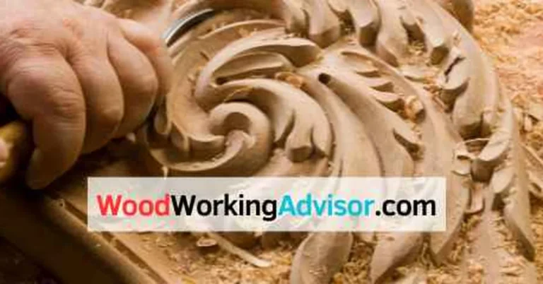 Hand carving intricate acanthus scroll detail into wood before staining