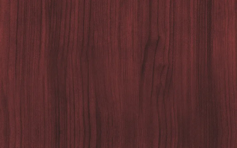 Close-up of dark red mahogany wood grain before lightening Close-up of dark red mahogany wood grain before lightening