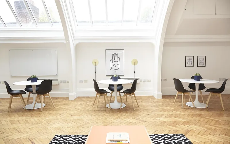 modern dining chairs with wooden legs on a light herringbone parquet floor modern dining chairs with wooden legs on a light herringbone parquet floor