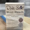 Dixie Belle two-part wood bleach kit box on a wooden table