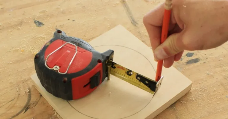 Using a tape measure pivoted at center to draw a radius circle on wood