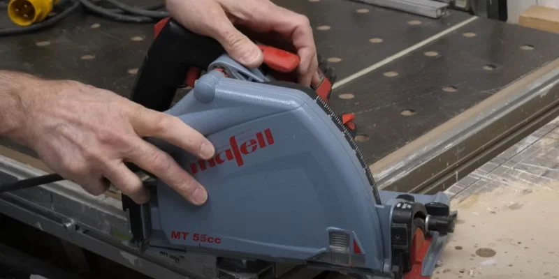 Close-up of the Mafell MT 55cc track saw motor housing and blade guard