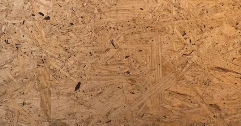 close-up of OSB oriented strand board showing the layered wood-strand construction Lowes sells