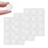 Self-adhesive clear rubber anti-slip pads for a glass table top