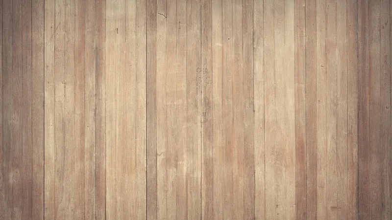 Sealed light hardwood floor boards, dry and intact after cleaning