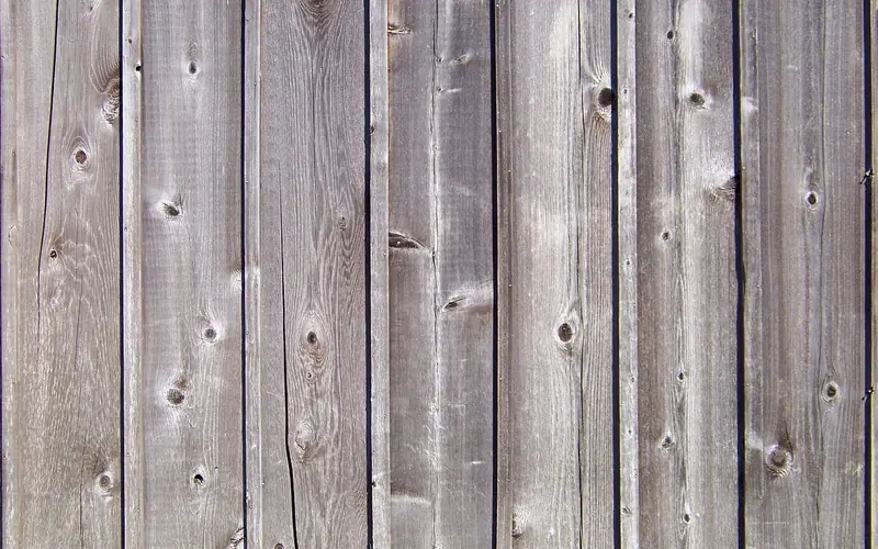 close-up of naturally weathered grey wood deck boards