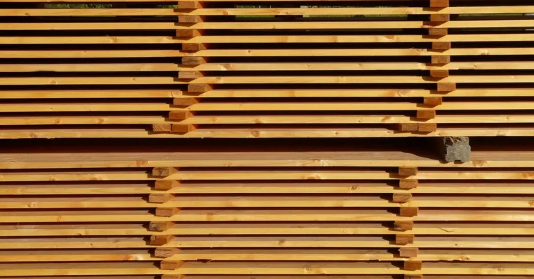 Sawn boards stacked with spacers so air can circulate
