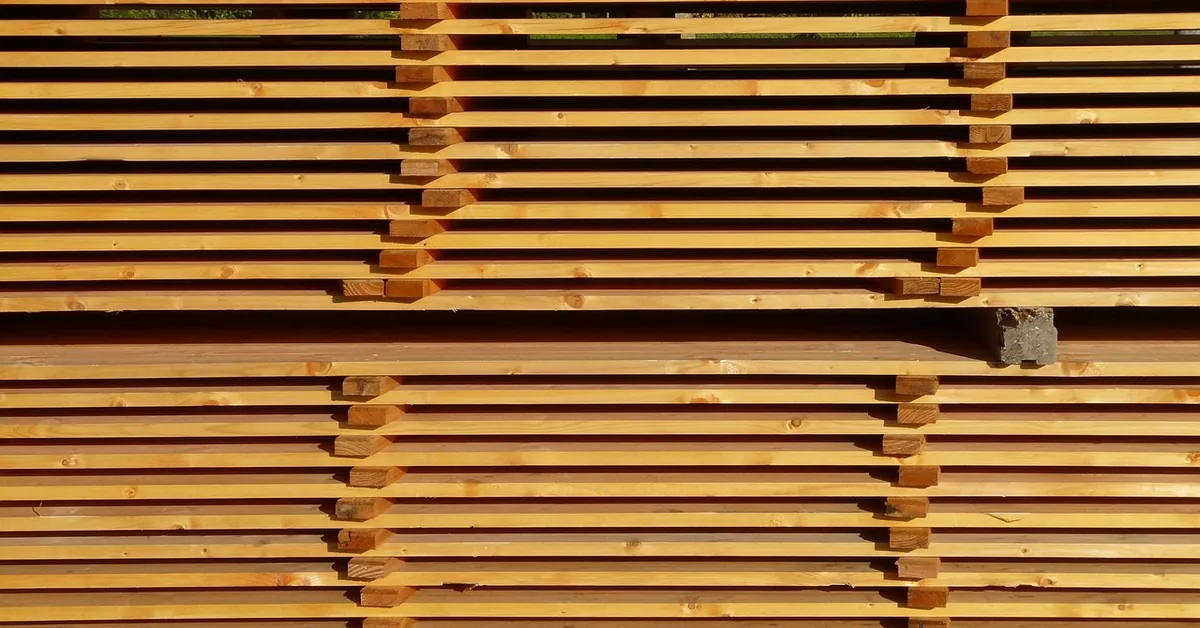Sawn boards stacked with spacers so air can circulate