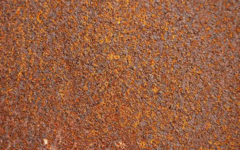 close-up of a rusty, oxidized metal surface that needs cleaning before gluing close-up of a rusty, oxidized metal surface that needs cleaning before gluing