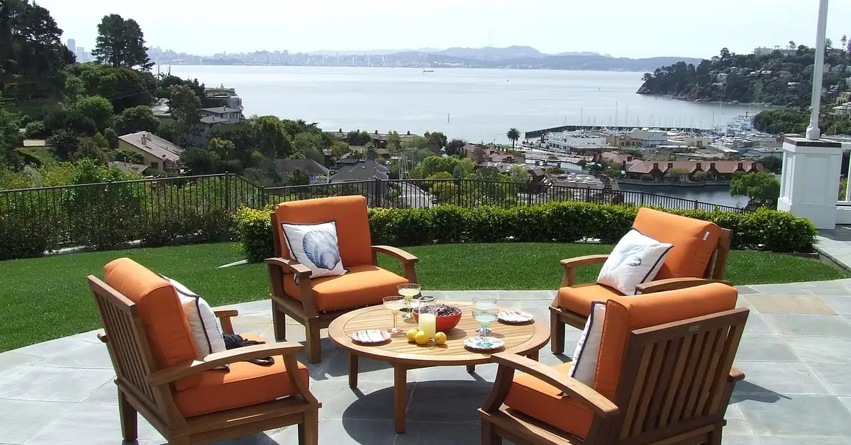 Teak patio furniture finished with oil, similar to oiling dense ipe wood