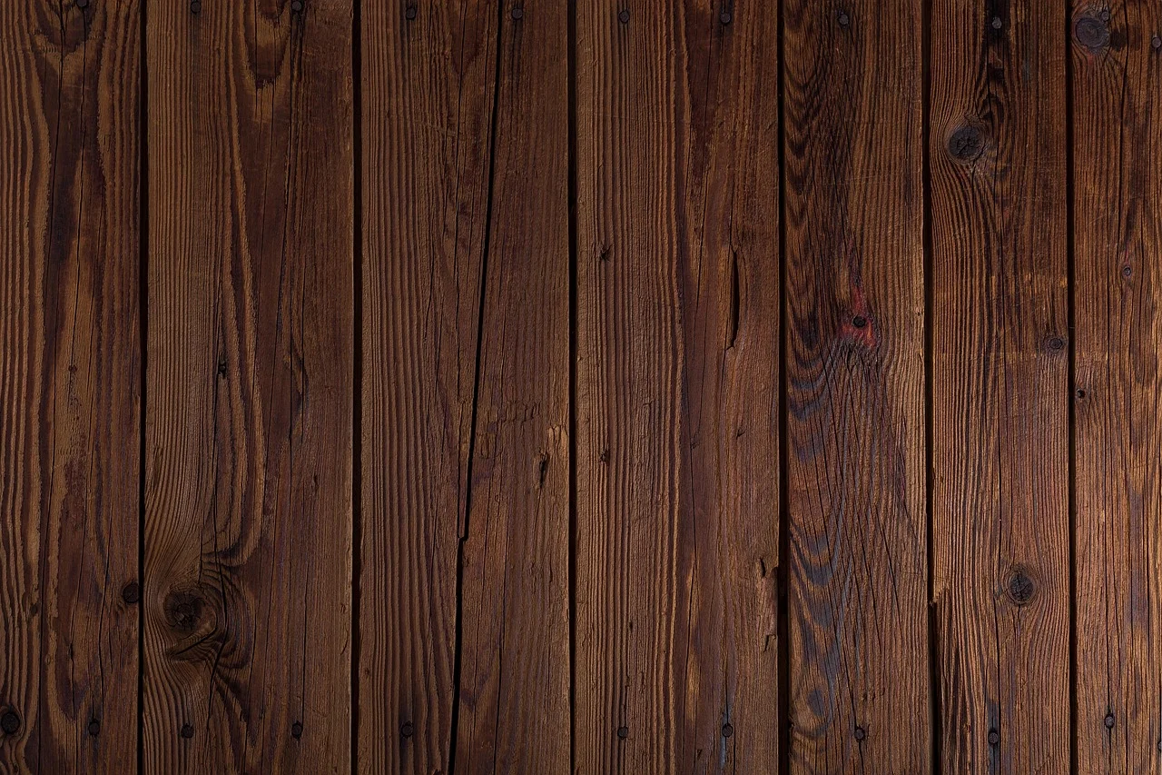 Close-up detail of rustic dark oak-look plank grain