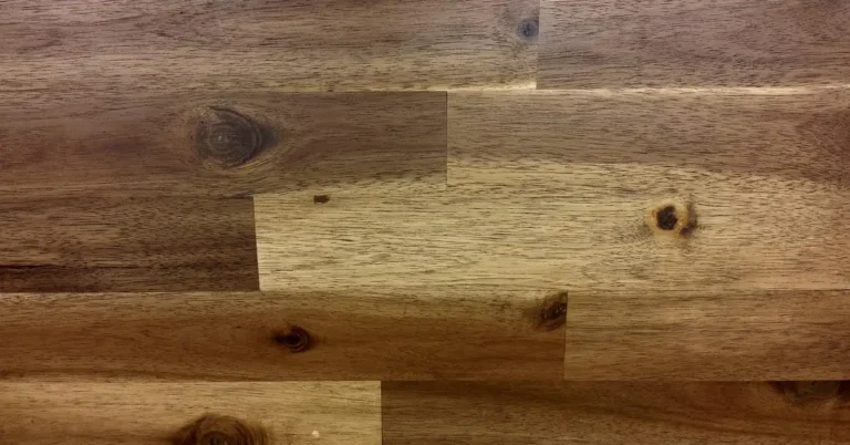 Walnut wood boards showing dark and lightened tones side by side