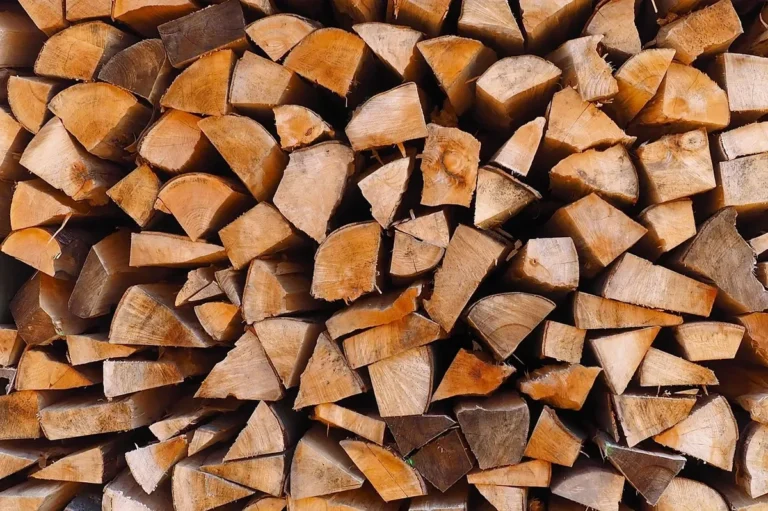Stack of split firewood logs, the job a buck saw is made for