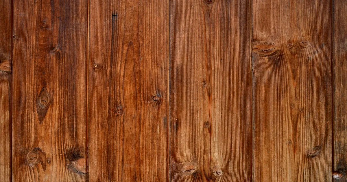 Brown pine boards with knots and visible grain