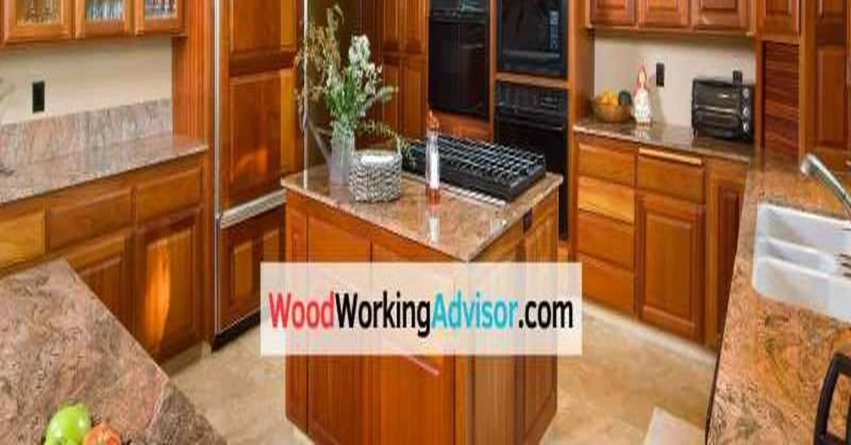 A warm-toned maple kitchen with an island and matching cabinetry