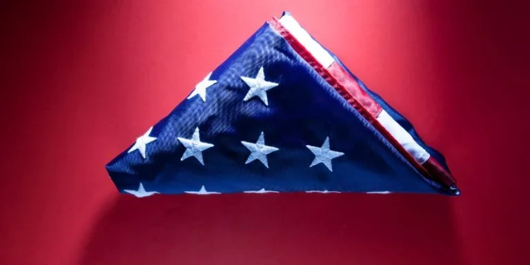 A correctly folded American flag in the traditional triangle shape