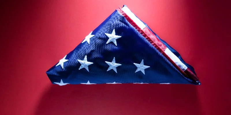 A correctly folded American flag in the traditional triangle shape