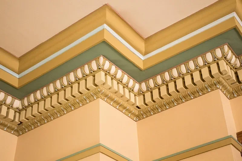 Painted cornice molding turning inside and outside wall corners