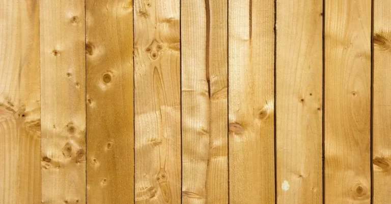 Raw knotty pine boards before staining