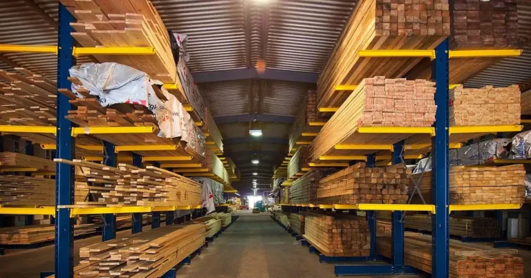 Stacked plywood and lumber sheets on warehouse storage racks