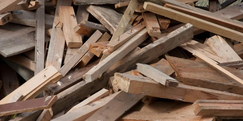 Pile of scrap lumber with visible nails