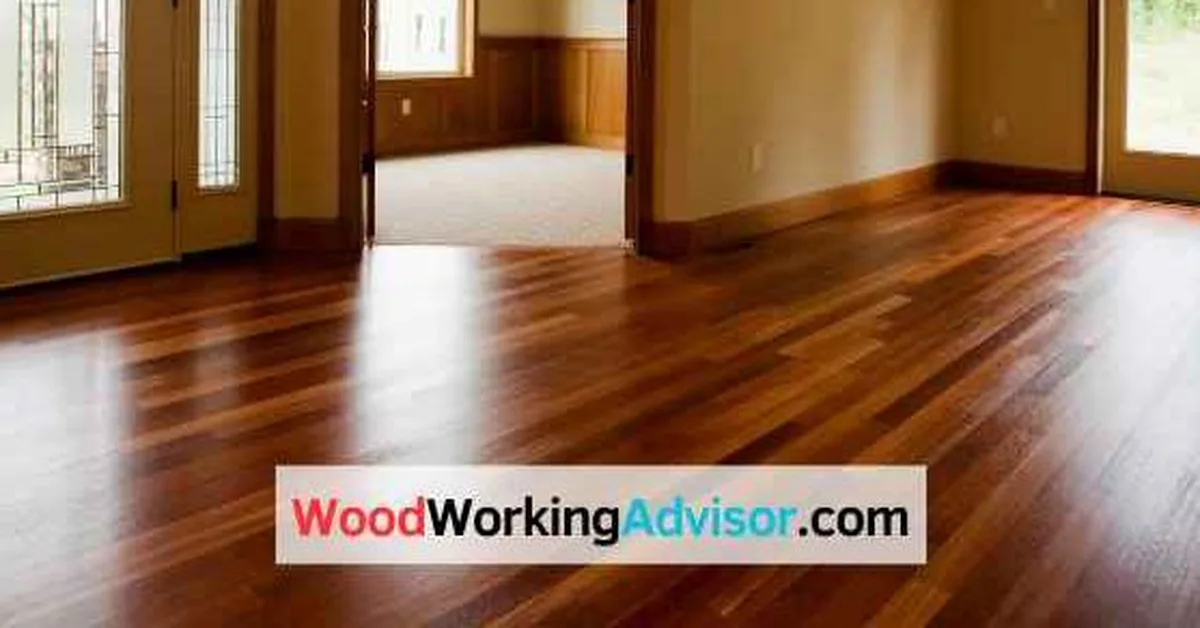 Orange-toned hardwood floor in a living room before color correction