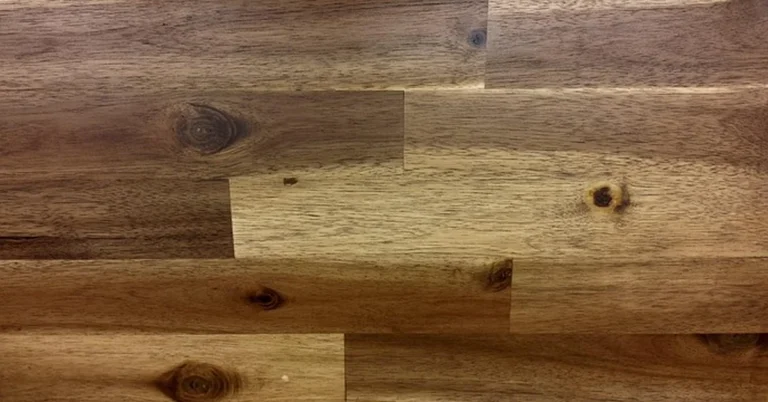 Walnut wood grain showing its natural warm brown color before finishing