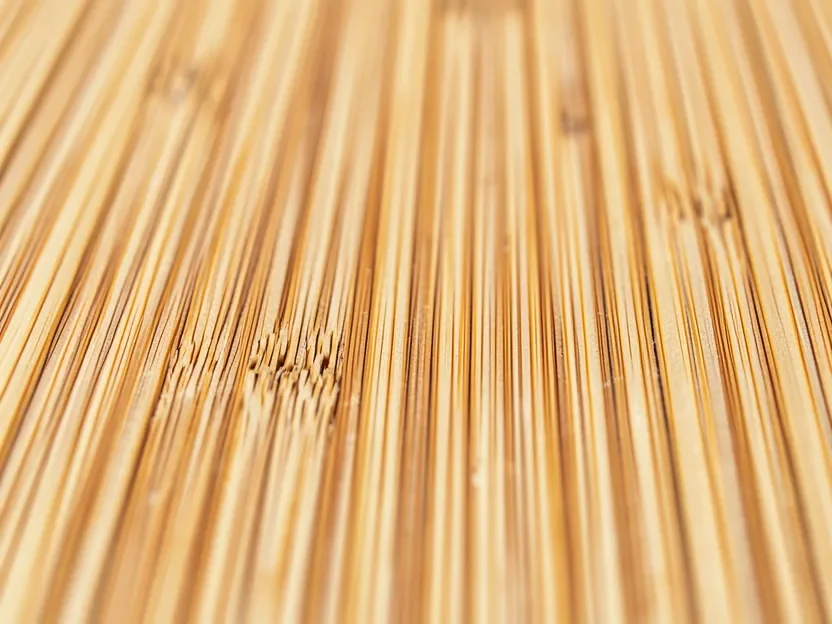 Close-up of bamboo plywood strand-woven grain pattern