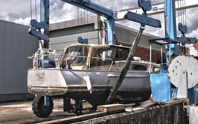 Boat hauled out on a dry dock for hull repair
