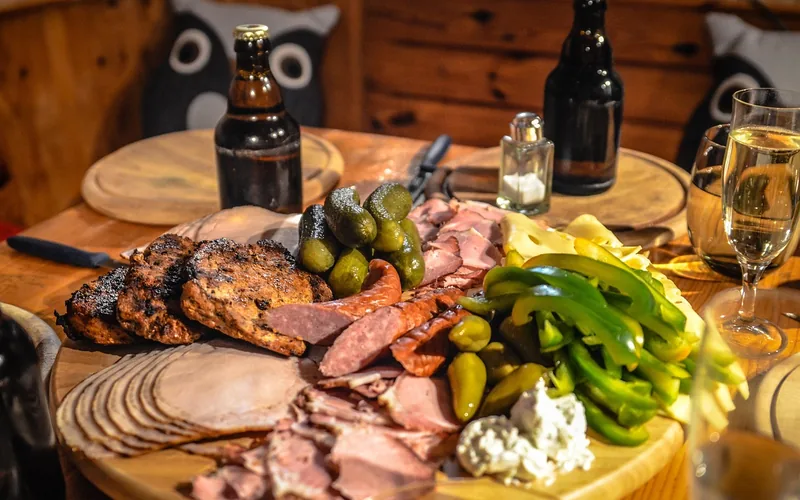 charcuterie spread served on a wood board with a handle