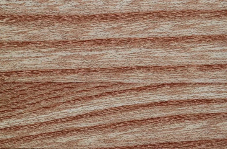 Close-up of elm wood grain with reddish-brown figure lines