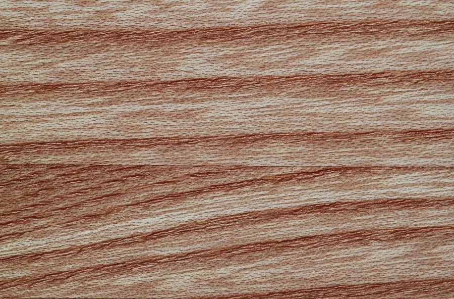 Close-up of elm wood grain with reddish-brown figure lines