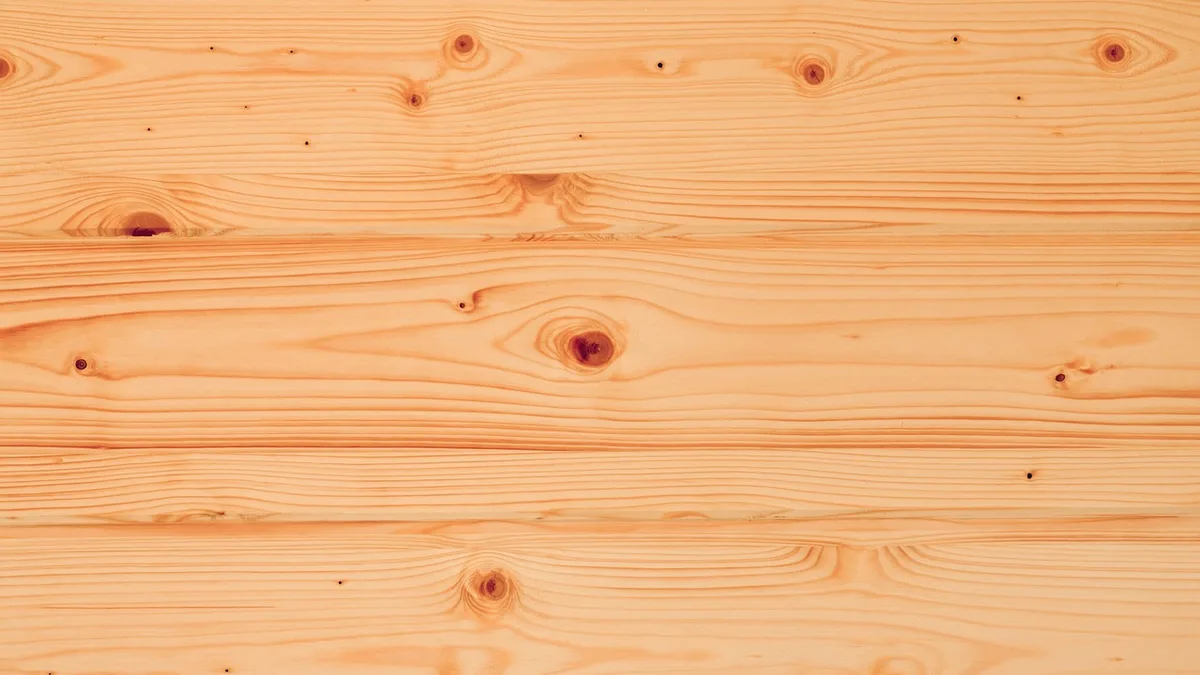 Natural pine boards with small knots and visible grain