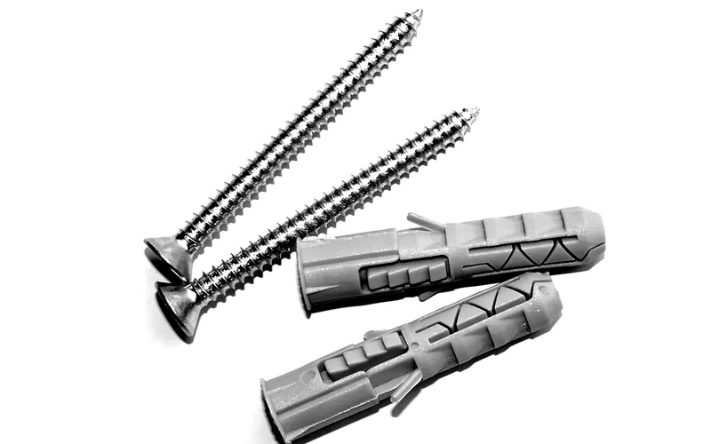 close-up of screws and plug fasteners used for hidden deck fastening